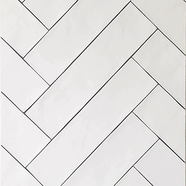 Herringbone tile, off-white with undulated surface